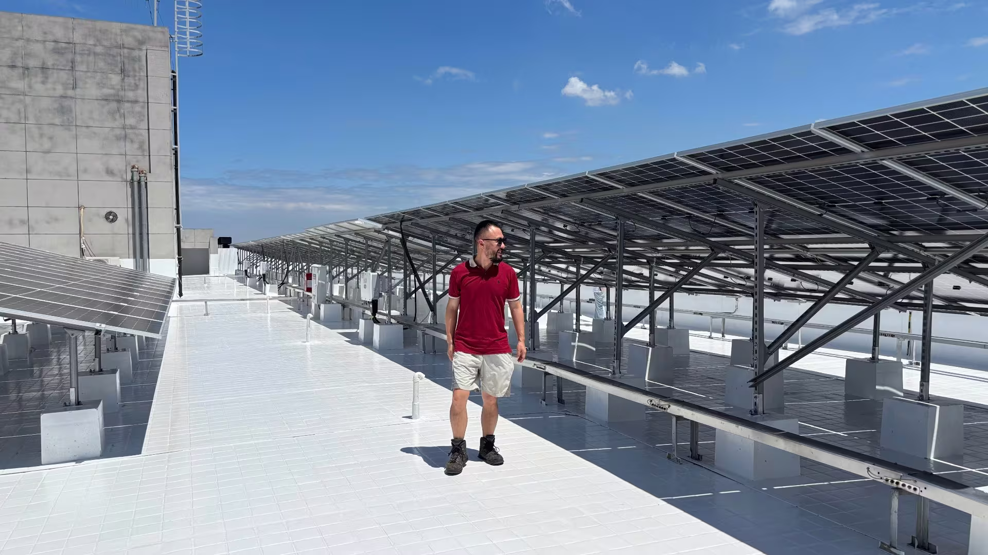 Dr. Ye Tao with reflective cooling panels during MEER's technical work in China